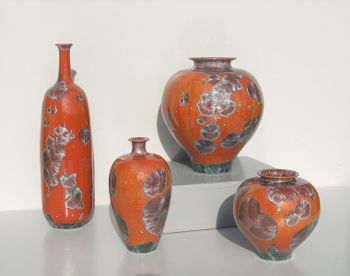 4 Vases rouge corail différents